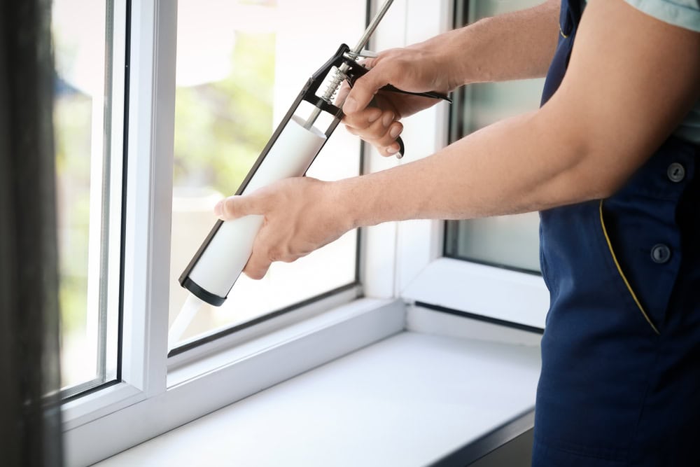 air sealing window to improve home insulation and overall energy efficiency