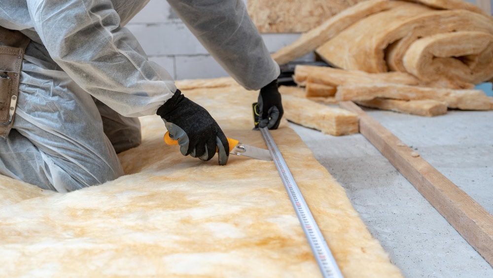 installing insulation in a home in massachusetts to improve home energy efficiency and overall performance to make it more comfortable in all four seasons