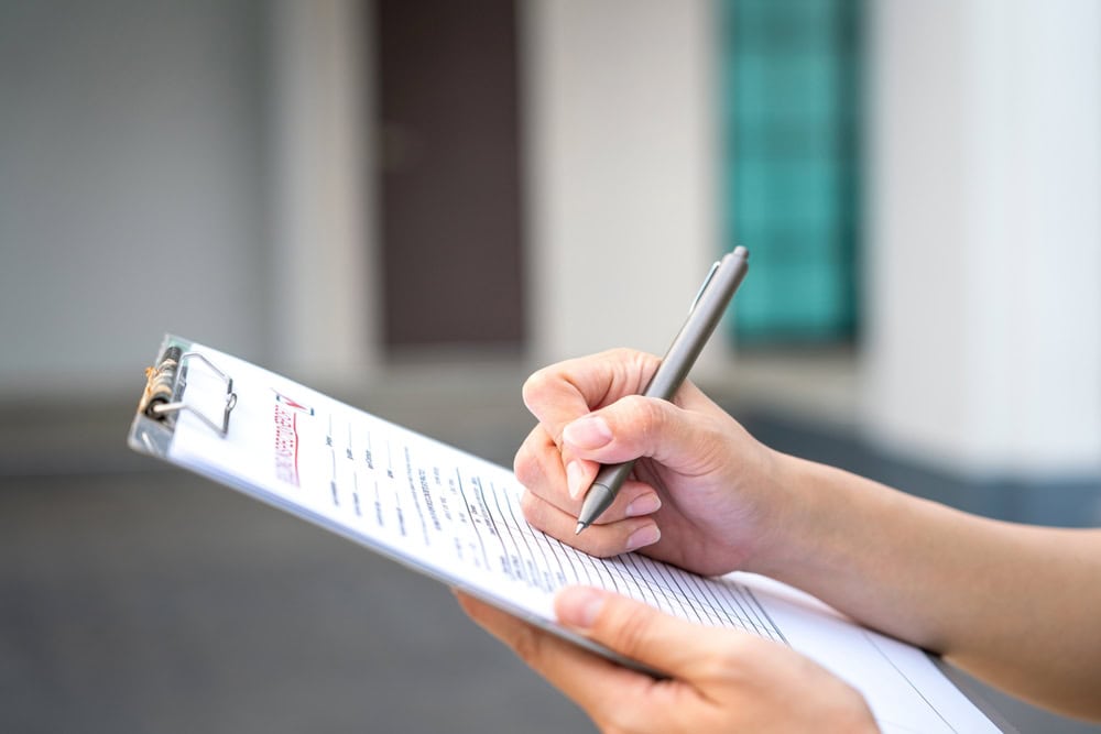 inspection of home during a mass save no-cost energy assessment to lower utility bills and keep home more comfortable throughout the year