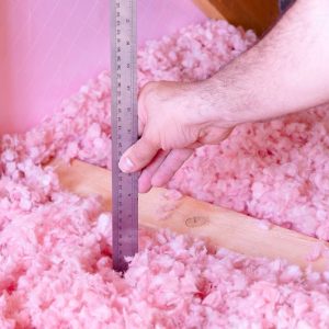measuring insulation to determine r-value and if it matches the right value for home location and climate