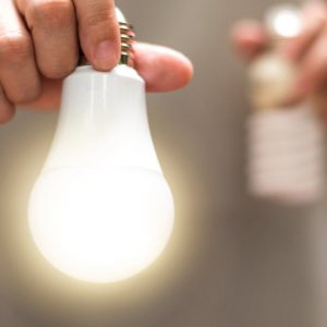 Power,Saving,Concept.,Hands,Holding,New,Light,Emitting,Diode,(